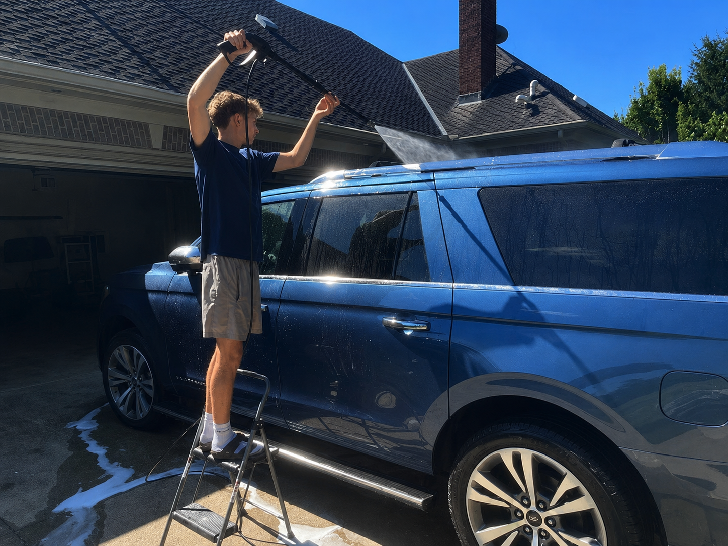 Fine Touch detailer washing SUV in Lexington, KY